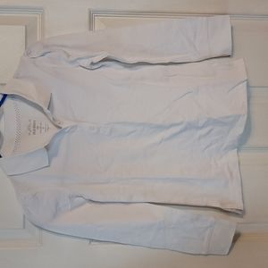 A white girl shirt size 8 with four buttons